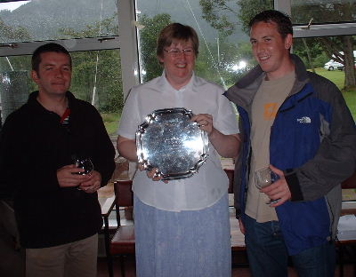 Vice Commodore Jose Hodgkins (hugging the winners trophy) with John Telford and Andy Smith